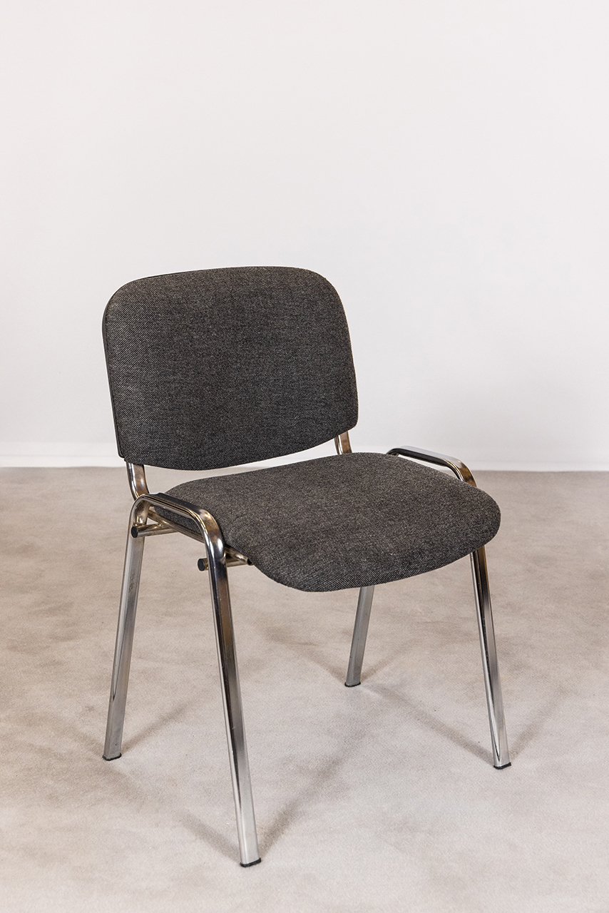 Grey, upholstered chair
